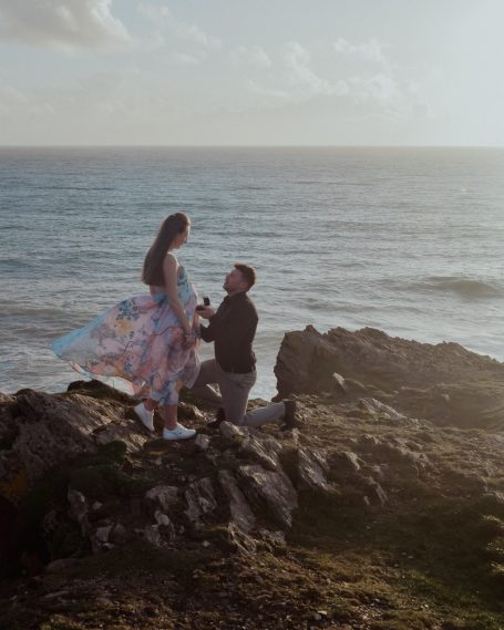 Proposing/engagement on a Newuay clifftop with beautiful coastal sea view